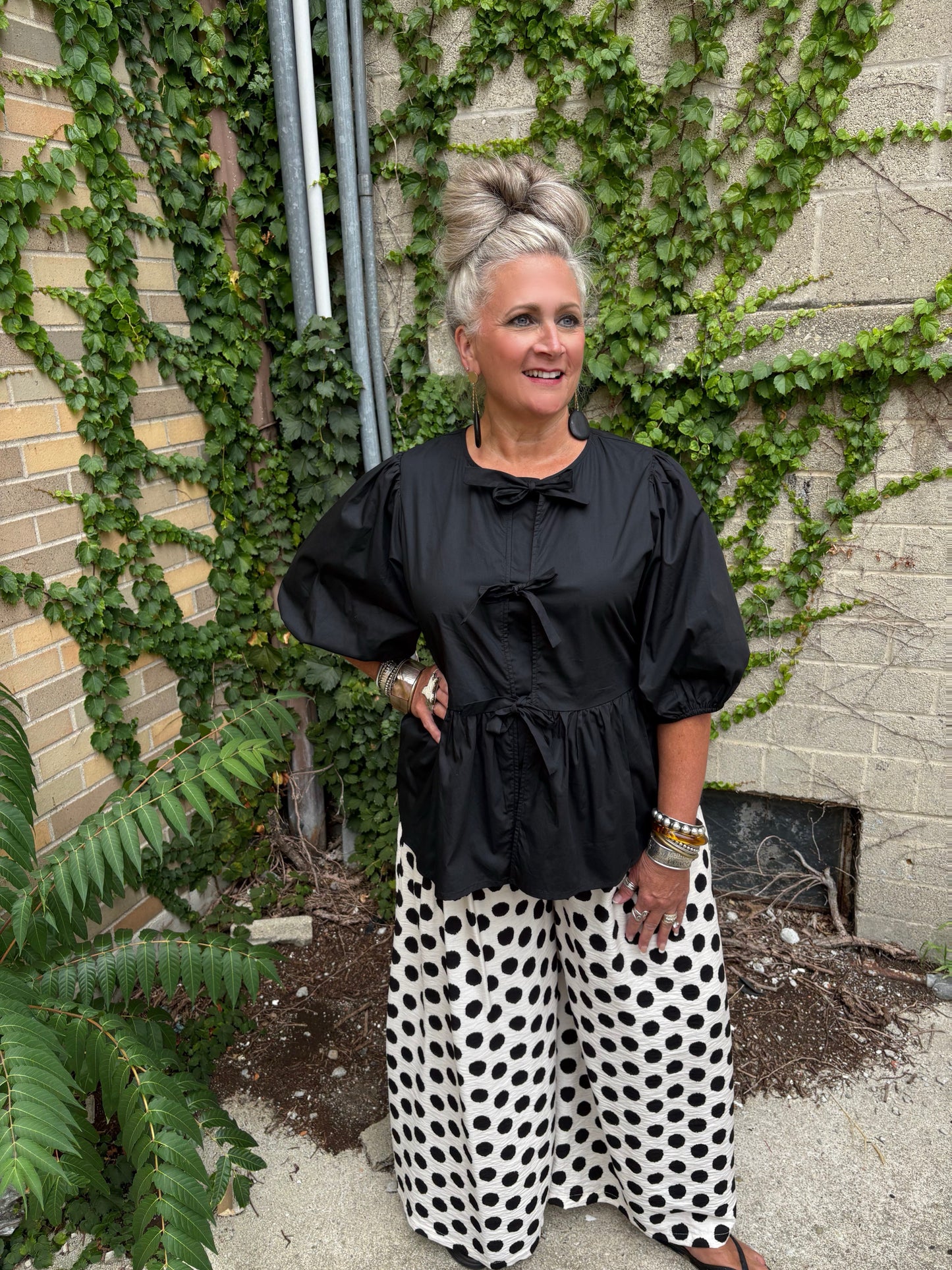 Bow Down Black Peplum Top
