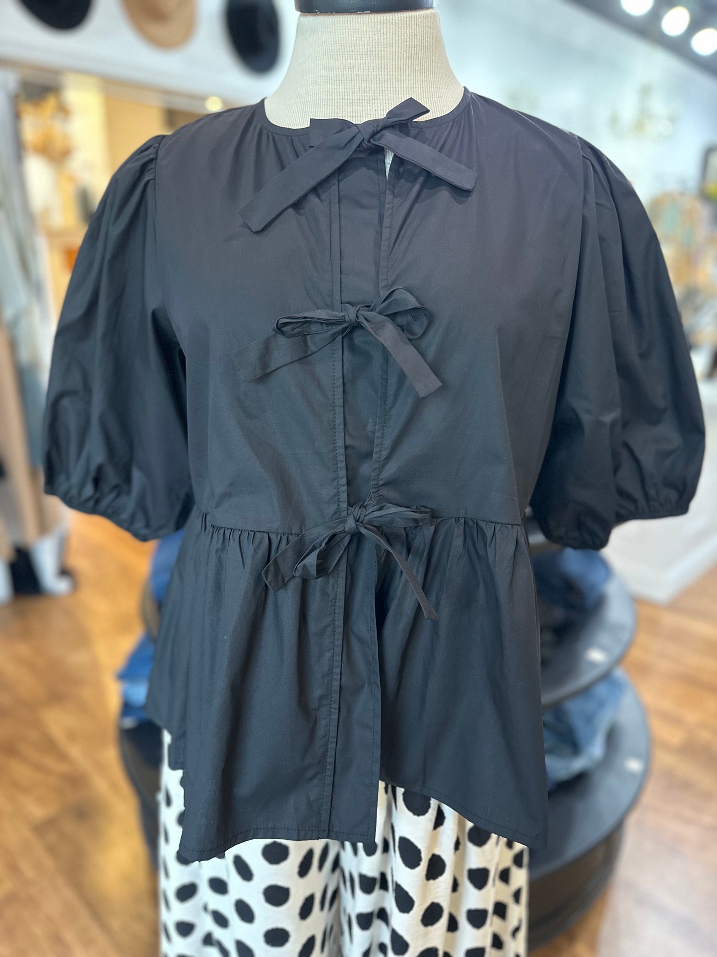 Bow Down Black Peplum Top